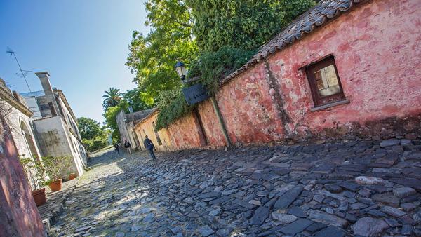 cobbled streets and colourful buildings on tour in Montevideo, Uruguay