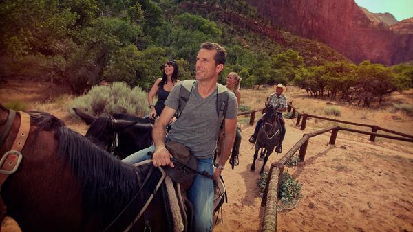 Man leading group on horseback in Arizona, USA